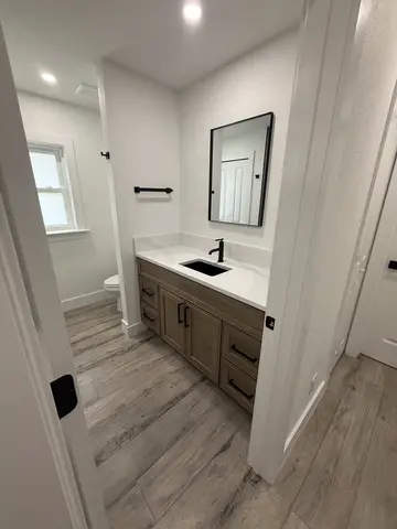 Bathroom remodel with new vanity and finishes