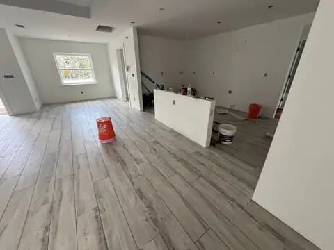 Wood-look flooring installation during interior remodel