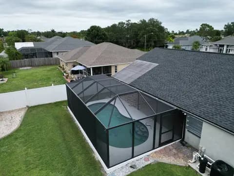 Aerial view of a screened lanai enclosure build