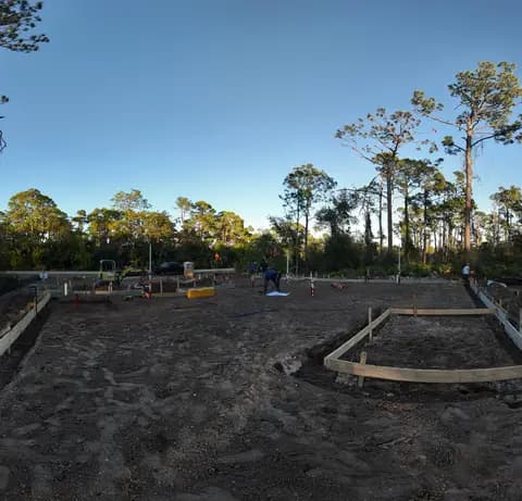 Foundation layout on a cleared new construction lot