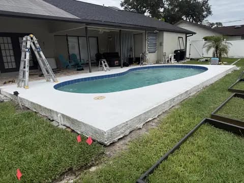 Backyard pool construction project in progress