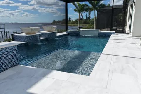 Travertine pool deck and coping on a completed pool remodel
