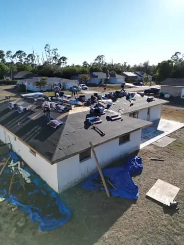Aerial view of roof dry-in stage during roof replacement