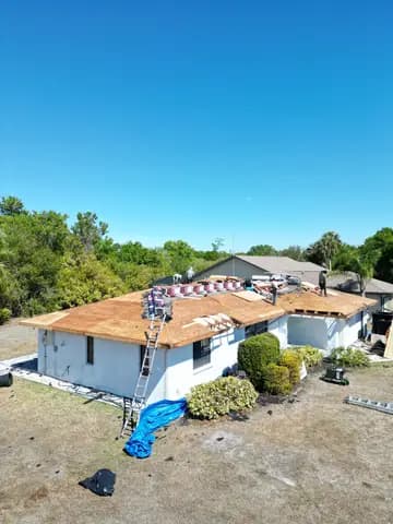 Full roof replacement in progress with underlayment installed